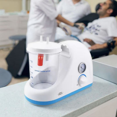 ভালো দাম ছোট আকারের মেডিকেল থুতু অ্যাস্পিরেটর পোর্টেবল কফ সাকশন ইউনিট বৈদ্যুতিক টেবিল ডিজাইন সাকশন মেশিন অনলাইন