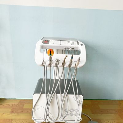 ভালো দাম ফোশন কারখানা 550W পোর্টেবল ডেন্টাল ইউনিট সেরা বিক্রেতা মোবাইল ডেন্টাল চিকিত্সা ট্রলিবাস বৈদ্যুতিক মোবাইল ডেন্টাল কার্ট অনলাইন